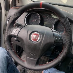 Volante Fiat Bravo revestido em courvim com marco zero e costura vermelha